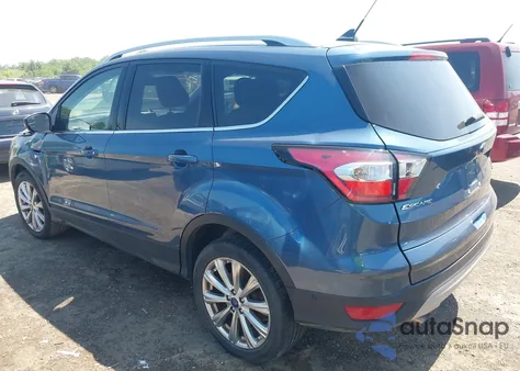 2018 Ford Escape Titanium z USA, uszkodzony, nr VIN 1FMCU9J93JUC80098